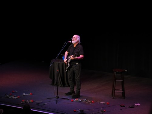 Bed of Roses at his feet