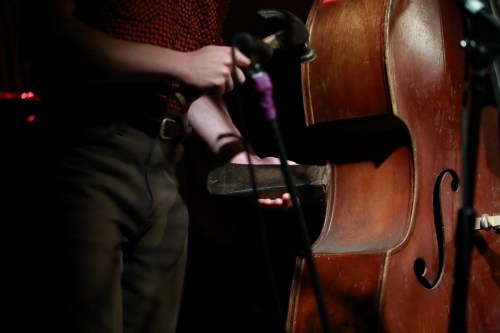Cameron banging on a rail stake with a hammer! I've never seen that before...