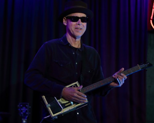 Markus James and his cigar box banjo