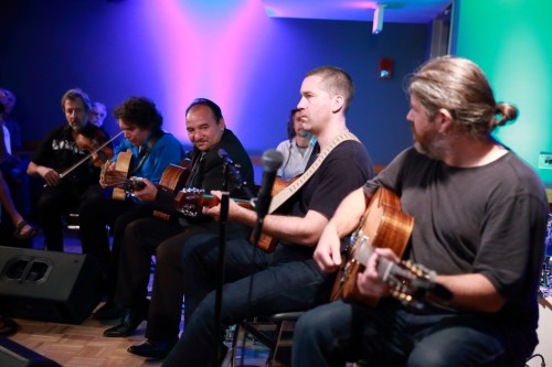 Four of the five guitarists!