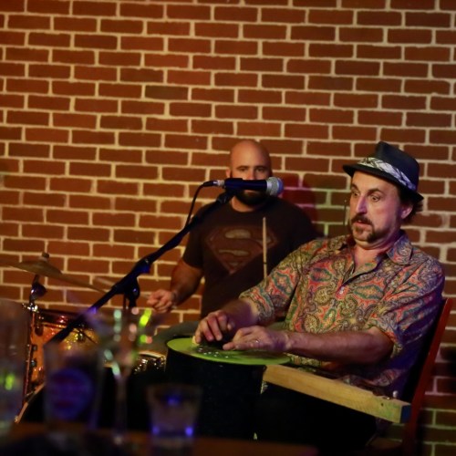 Ted Drozdowski on one of his diddley bows